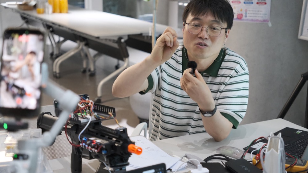 A maker filming the blaster he built in five hours